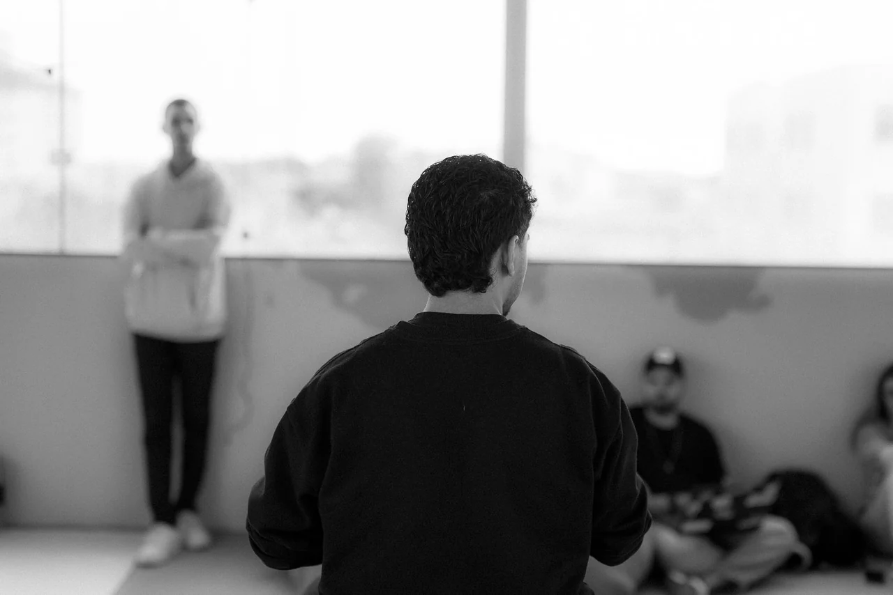 People listening to one another during a group discussion