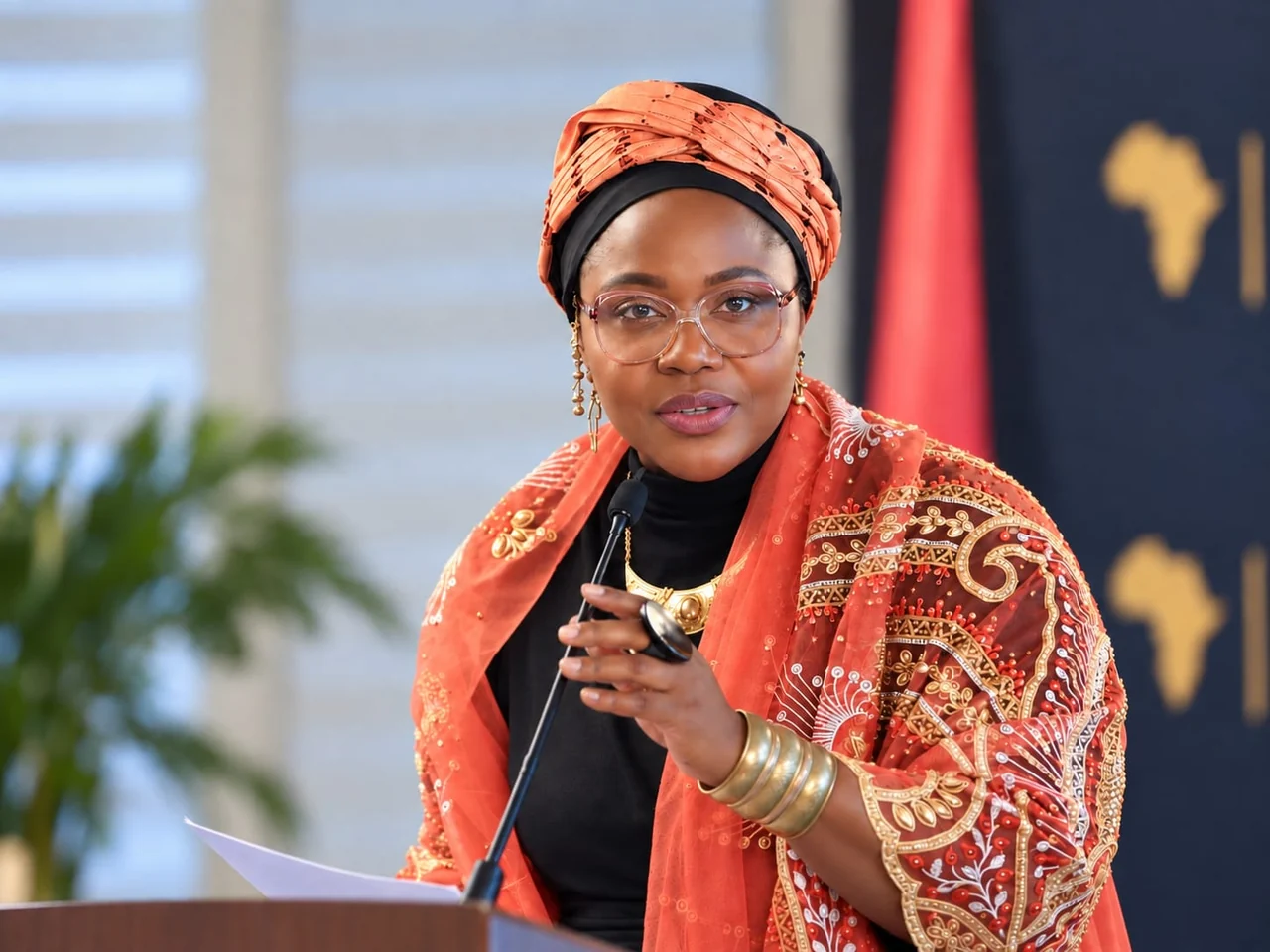 Joy-Jayne Bassey reading at a public gathering
