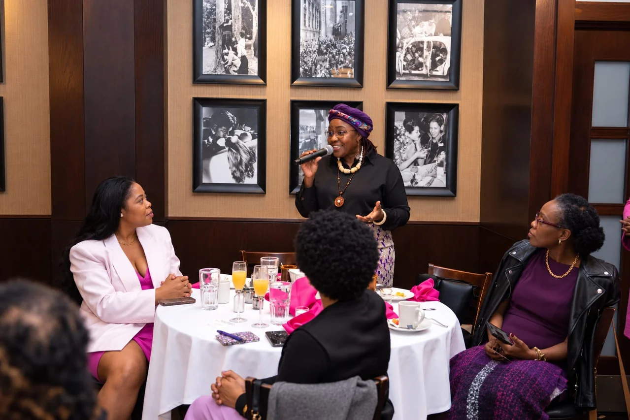 Joy-Jayne Bassey reading The Quiet Engine at an International Women’s Day gathering in Virginia
